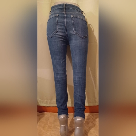 A DL1961 Ryan High-rise Blade Distressed Denim Jeans - Picture 4 of 9